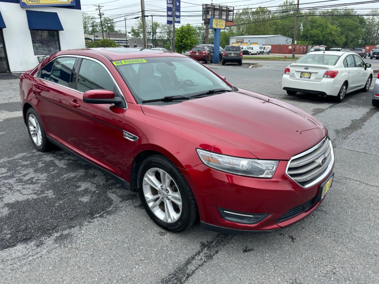 2013 RED Ford Taurus SEL FWD (1FAHP2E8XDG) with an 3.5L V6 DOHC 24V engine, 6-Speed Automatic transmission, located at 1254 Manheim Pike, Lancaster, PA, 17601, (717) 393-9133, 40.062870, -76.323273 - Photo#2